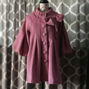 A’reve pink coat.